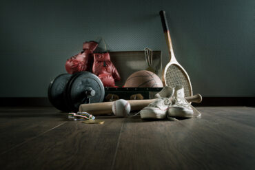 sport equipment in a vintage suitcase