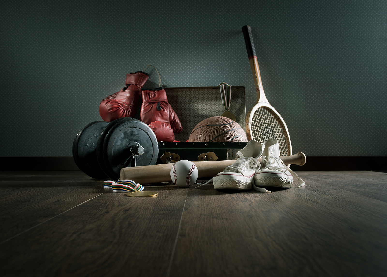 sport equipment in a vintage suitcase 